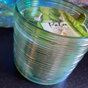 Palm leaves and mango candle